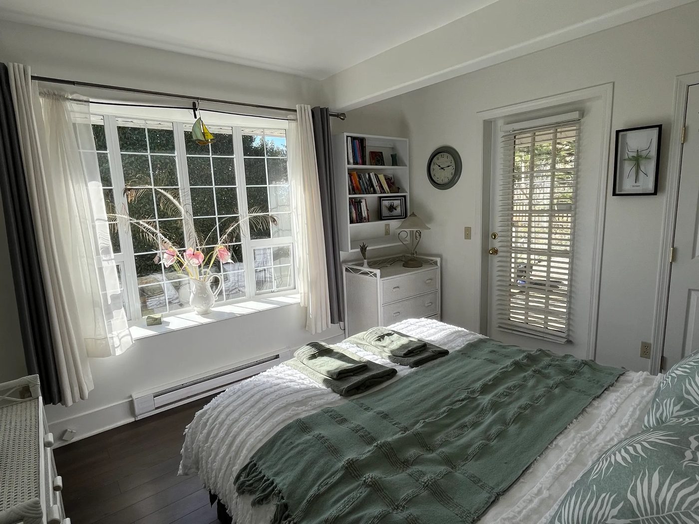 A bright, restful bedroom with garden doors
